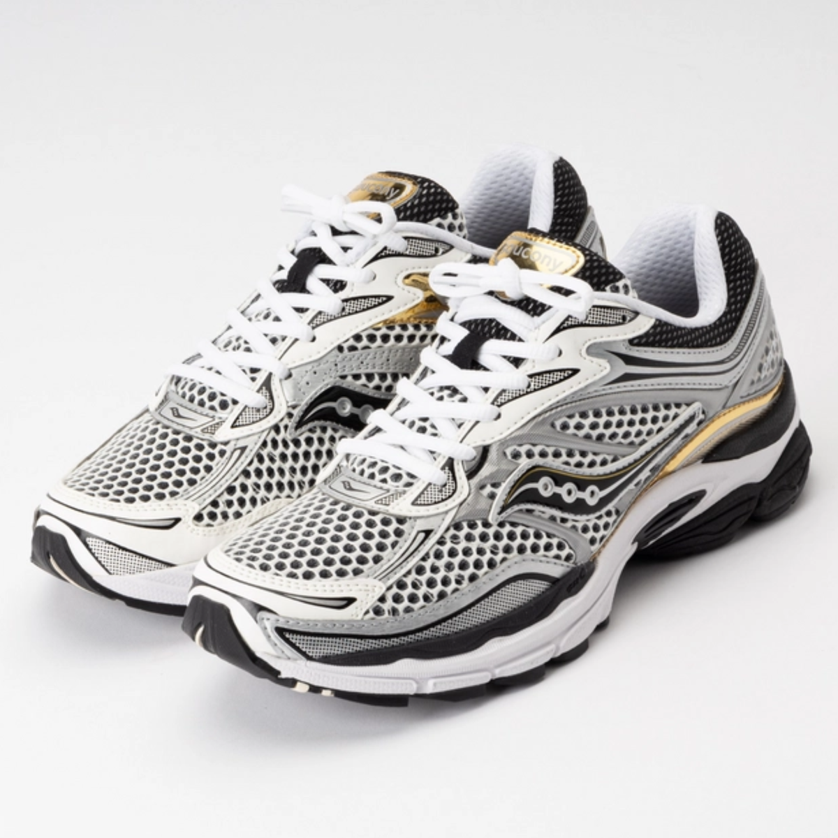 Saucony ProGrid Omni 9 Silver Gold Sneakers